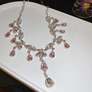 Sparkling waterdrop tassel necklace and earrings set with pink and clear crystals