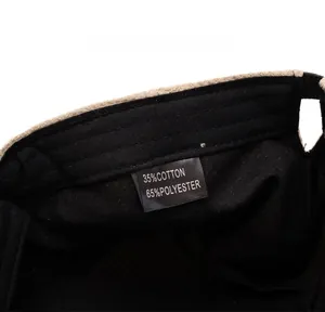 Détail de l'étiquette d'un béret homme montrant 35% coton et 65% polyester