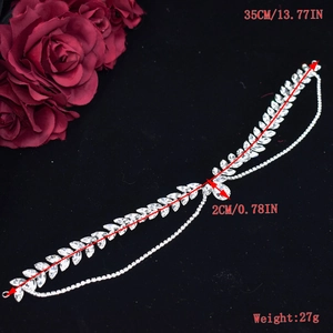 Detailed view of rhinestone leaf bridal headpiece with dimensions and silver tassel chain