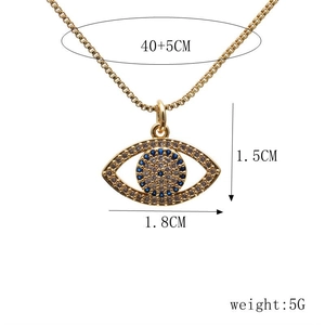 Detail of gold evil eye necklace with blue zircon size 1.5x1.8cm and 45cm chain length