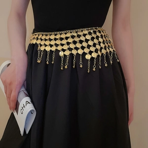 Detail of golden geometric coin fringe waist chain with multi-layer tassel design