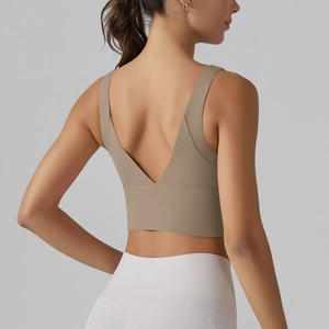 Close-up of V-shaped back design on dark khaki sports bra with high-elastic fabric