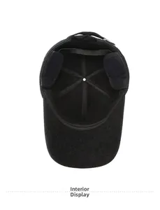 Detail of the warm fleece lining and foldable ear flaps inside this winter baseball cap