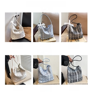 Detailed grid view of minimalist polka dot tote bags in white, blue, and black finishes