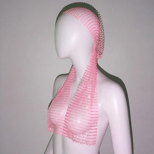 Detail view of pink rhinestone fishnet scarf showing sparkling diamond-like grid patterns