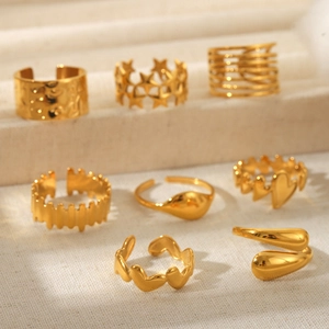 Set of minimalist 18K gold plated stainless steel rings in various stylish geometric designs