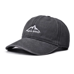 Close-up of BIG BRO mountain embroidery on washed dark grey cotton baseball cap