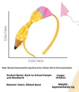 Detail view of handmade pencil-themed hair bow for children with size measurements