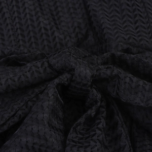 Elegant black mesh dress with ruffled V-neckline and waist tie detail in a textured fabric