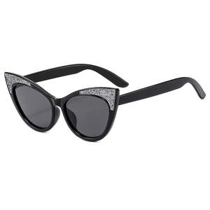 Fashionable cat-eye children's sunglasses with silver glitter accents and dark grey lenses