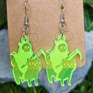 Neon green acrylic skull cat earrings for Halloween featuring reaper riding a cat
