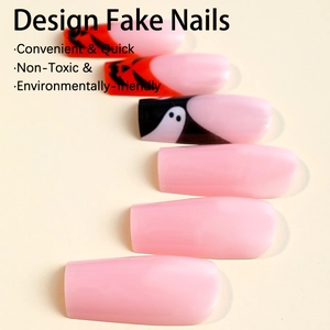 Halloween press-on nails featuring pumpkin and ghost designs on long coffin shapes