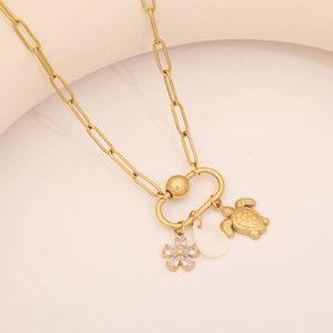 Golden paperclip chain necklace with sea turtle and white teardrop shell pendant charms