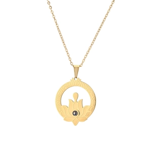 Golden titanium steel necklace with a hollow lotus pendant and black projection stone