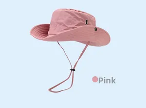 Close-up of pink quick-dry hiking hat featuring breathable vents and adjustable wind rope