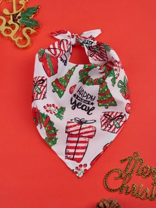 Detail of Christmas pet triangle bib with festive prints and Happy New Year text