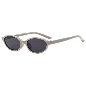 Vintage oval beige sunglasses with dark lenses for women, stylish 2025 retro frame design