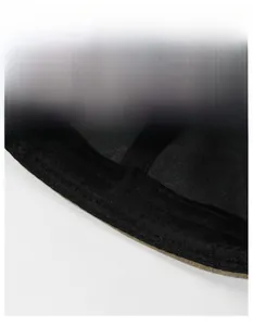 Close-up of a wide sweat-absorbent band inside a vintage washed cotton skull cap