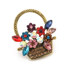 Vintage floral basket brooch with multicolor rhinestones and antique bronze finish