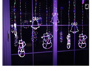 Colorful LED Christmas window lights featuring snowman and bell designs for holiday decor