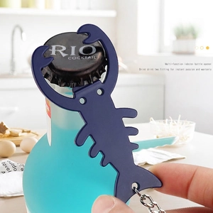 Multifunctional lobster shaped metal bottle opener keychain opening a cocktail bottle