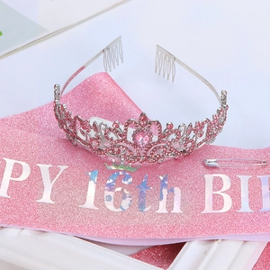 Detail of silver crown with pink rhinestones and 16th birthday glitter sash set