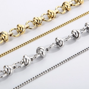 Double-layered gold and silver stainless steel link chains with a knotted metal design