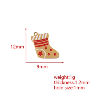 Detail view of 18K gold plated Christmas stocking pendant with precise dimensions and weight