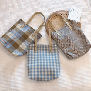 Vintage checkered canvas tote bags with leather handles in three diverse plaid patterns