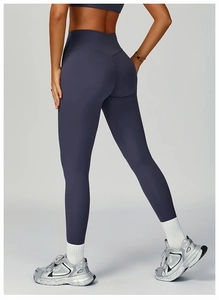 High-waisted yoga leggings in dark navy with V-shaped rear waistband and sculpting fit
