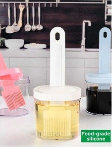 Detail of food-grade silicone brush head and integrated oil bottle for kitchen cooking