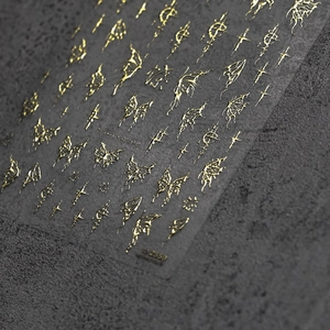 Adesivi per unghie farfalla oro gotico con texture metallica goffrata e stelle
