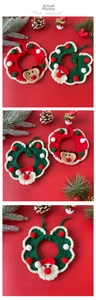 Detail of handmade crochet pet collars with Santa and reindeer motifs for Christmas