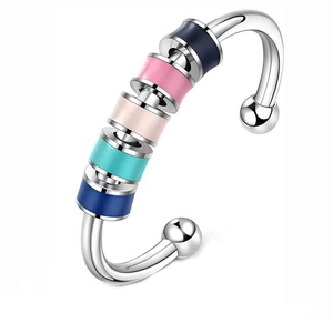 Adjustable silver bangle with five colorful rotating beads for anxiety relief and decompression