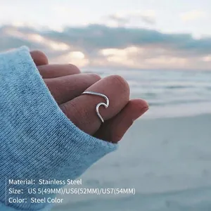 Elegant stainless steel wave ring for women available in sizes US 5, 6, and 7