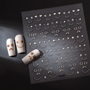 3D metallic silver nail stickers with smileys and stars on model Co-340 display
