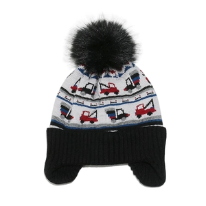 Detail of gray knit winter hat for kids with colorful construction truck patterns