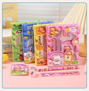 Detail of 5-piece cartoon stationery set with ruler, pencils, sharpener, and notebook