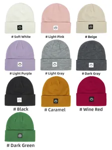 Detailed grid view showing ten diverse color options of the knitted smiley face beanie