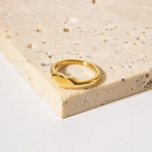 Minimalist 18K gold plated heart signet ring for men and women on a stone base