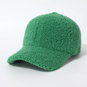 Close-up of the thick grass green teddy fleece texture on the warm baseball cap