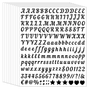 Macro shot of black handwritten cursive alphabet and number vinyl stickers for DIY crafts
