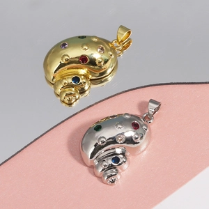 Pendentif etoile de mer avec zircons colores en finition or et argent