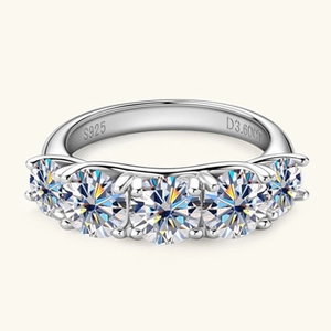 Detailed macro of S925 sterling silver band with 3.60ct five-stone round-cut crystals