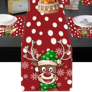 Christmas table runner and placemat set with red reindeer and white snowflake patterns