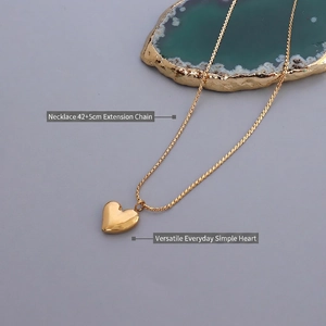 Polished 18k gold heart pendant necklace, length 42cm with 5cm extension chain