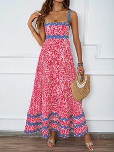 Detailed scalloped blue trim and abstract floral print on summer maxi dress
