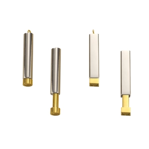 Polished stainless steel nesting pendant set with extendable gold inner core elements