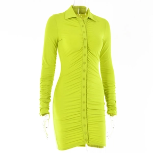 Close-up of fluorescent green bodycon dress featuring shirt collar and button details