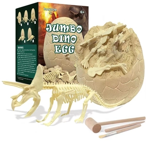 Detailed view of jumbo dino egg toy set with triceratops fossil and excavation tools